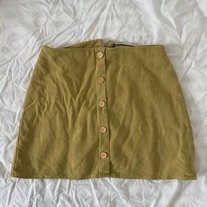 green button skirt, size S